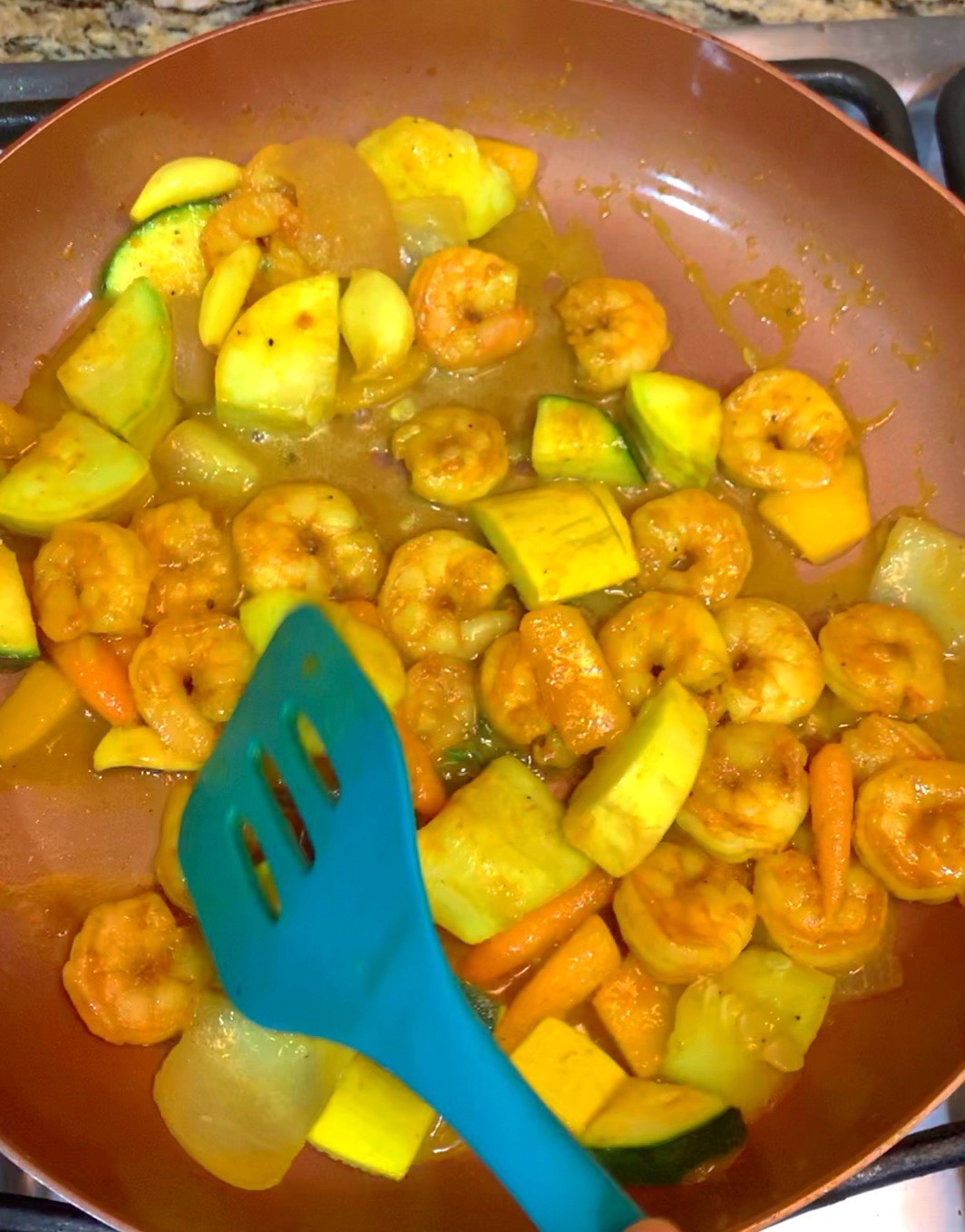 Tasty Curry shrimp medley simmering