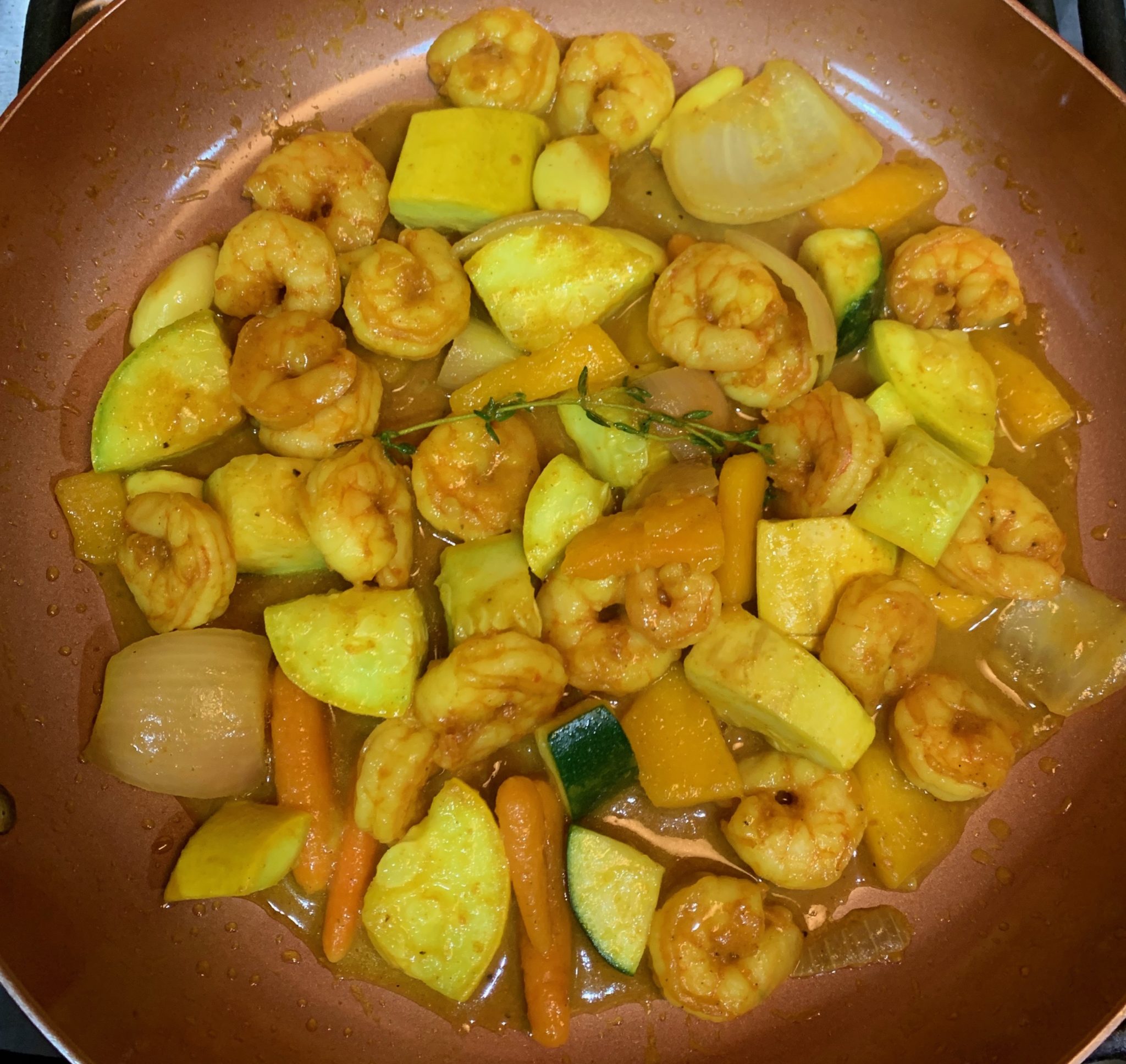 Tasty Curry shrimp in pot cooking