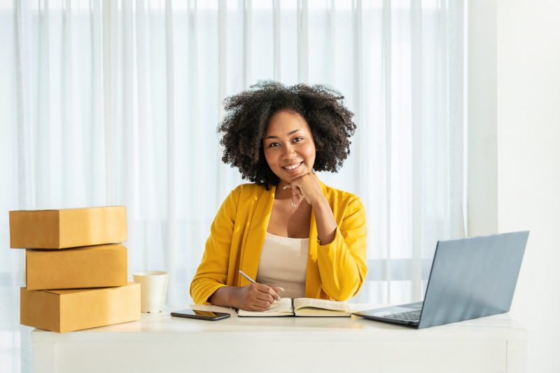 Portrait beautiful  SME business black woman smiling positive, B